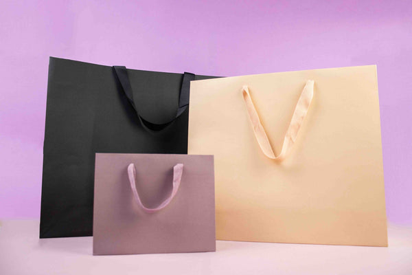 Hoe kies je de juiste luxe papieren tas voor jouw product?